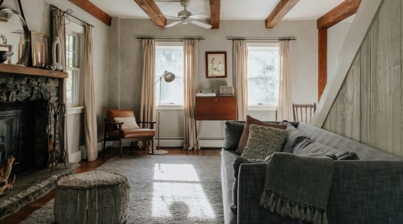Small cozy living room in soft neutral tones with a comfortable sofa