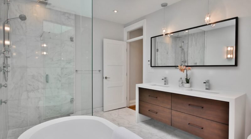 Spa-like modern bathroom with a white bathtub next to a walk-in shower