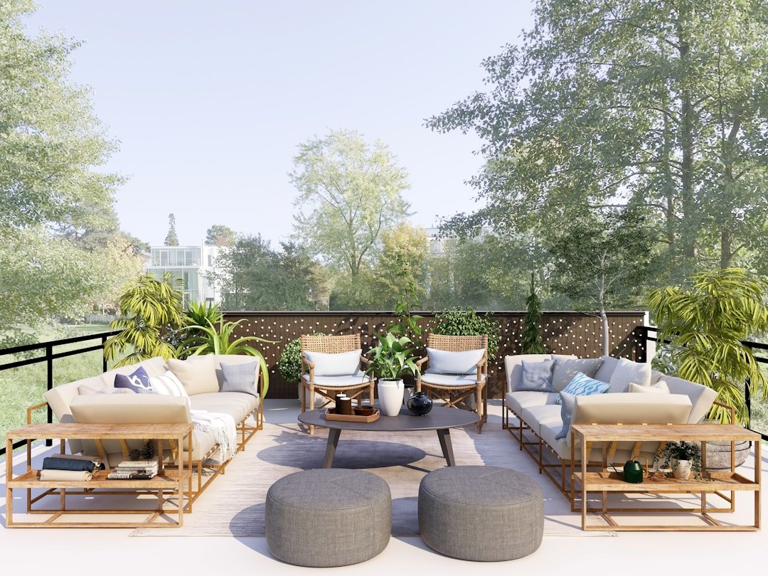 Outdoor living room with cushioned patio seating and a coffee table