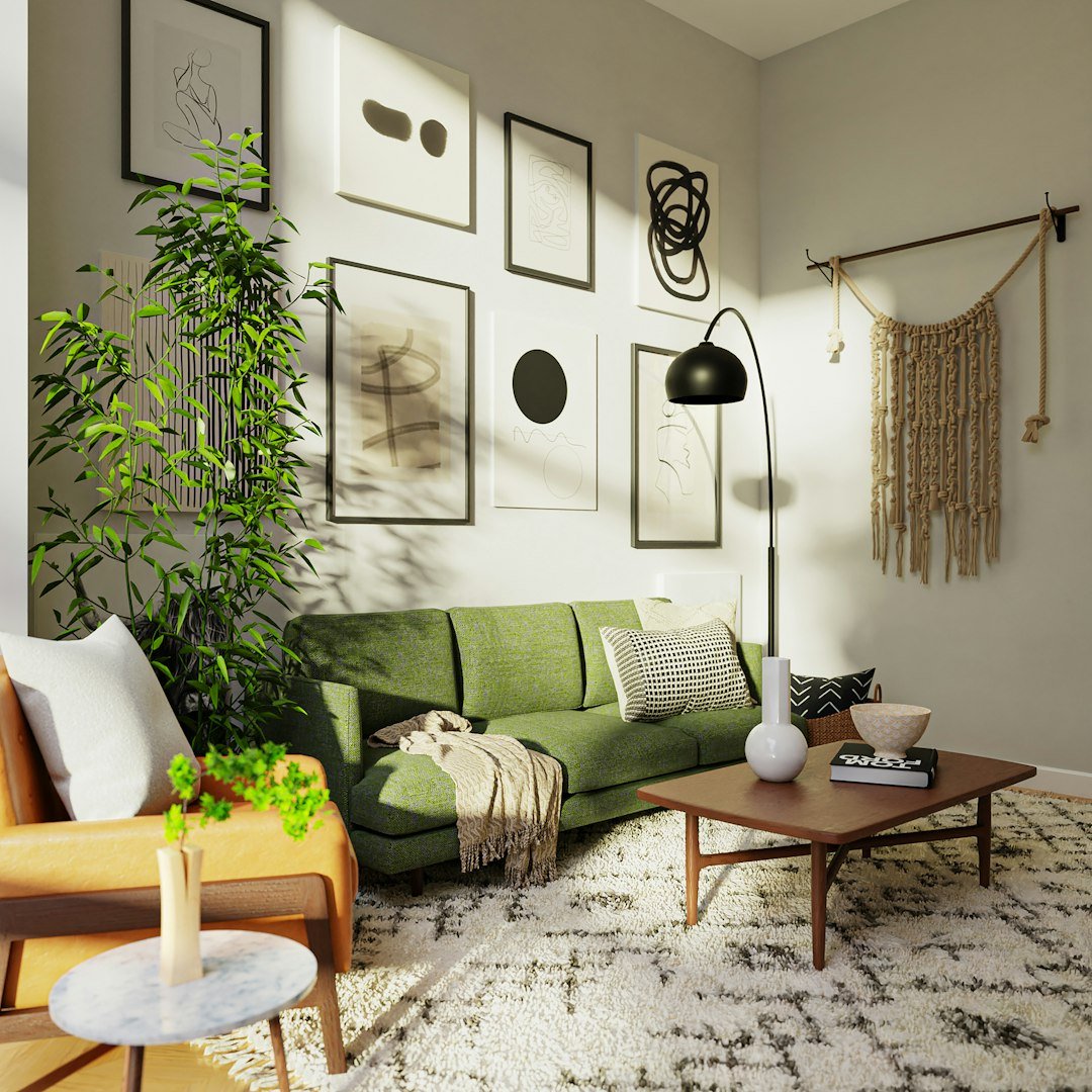 Living room with a sage green sofa and neutral coffee table, sage green living room ideas