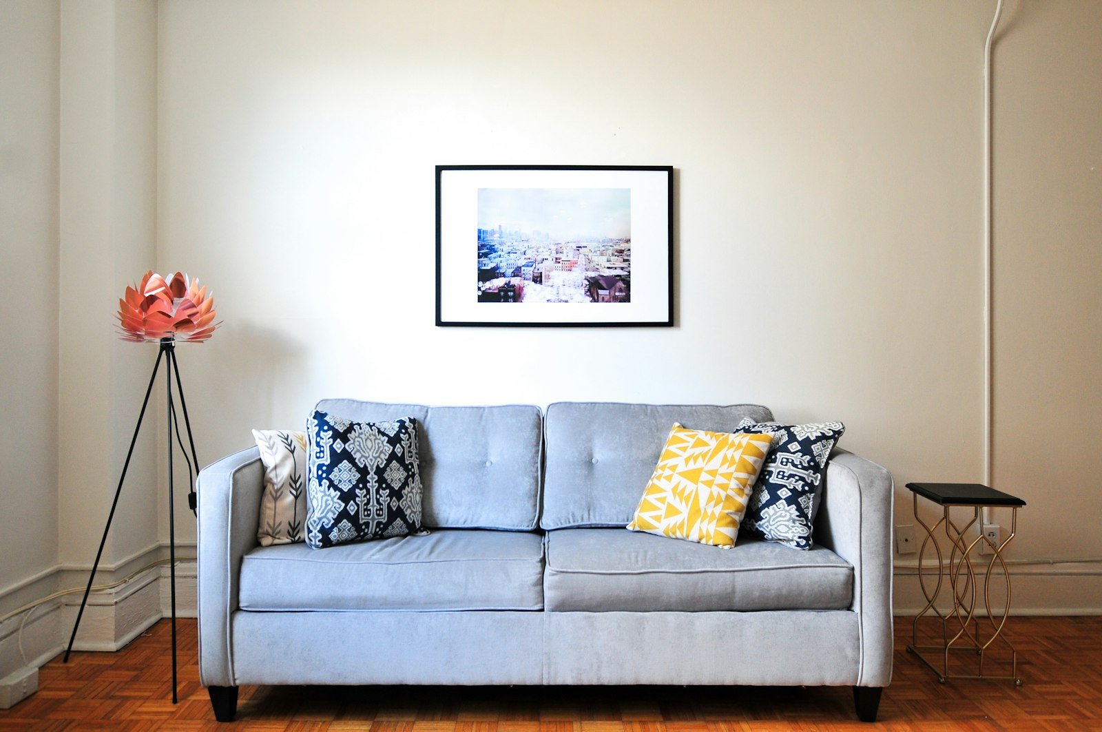 Compact sofa and slim furniture in a small apartment living room