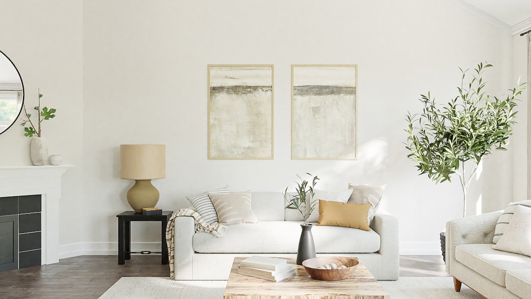 Soft neutral autumn color palette in a beige living room with a fireplace