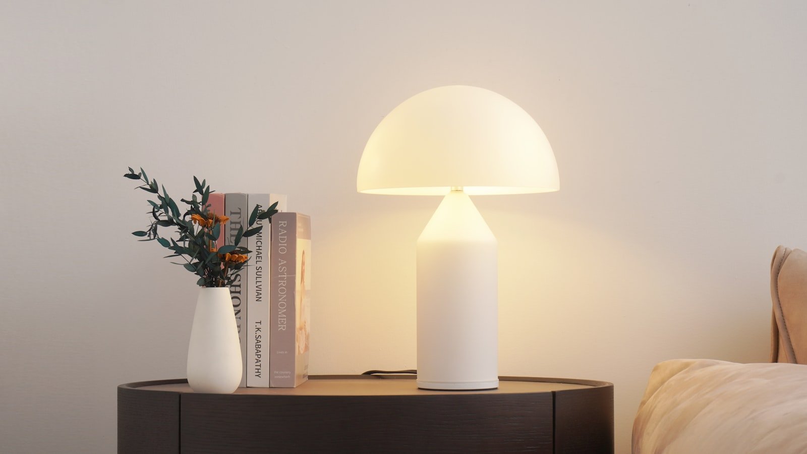 Warm white table lamp giving soft low level light in an apartment
